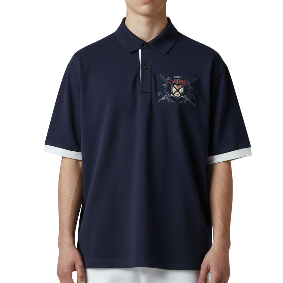 CAMISETA CON CUELLO | ESCUDO 1976 | REG. F./ T. POLO | AZ. M./BL | HOMBRE