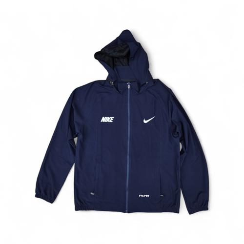 ROMPEVIENTO BASIC. IMPERMEABLE CON CAPUCHA DESPRENDIBLE